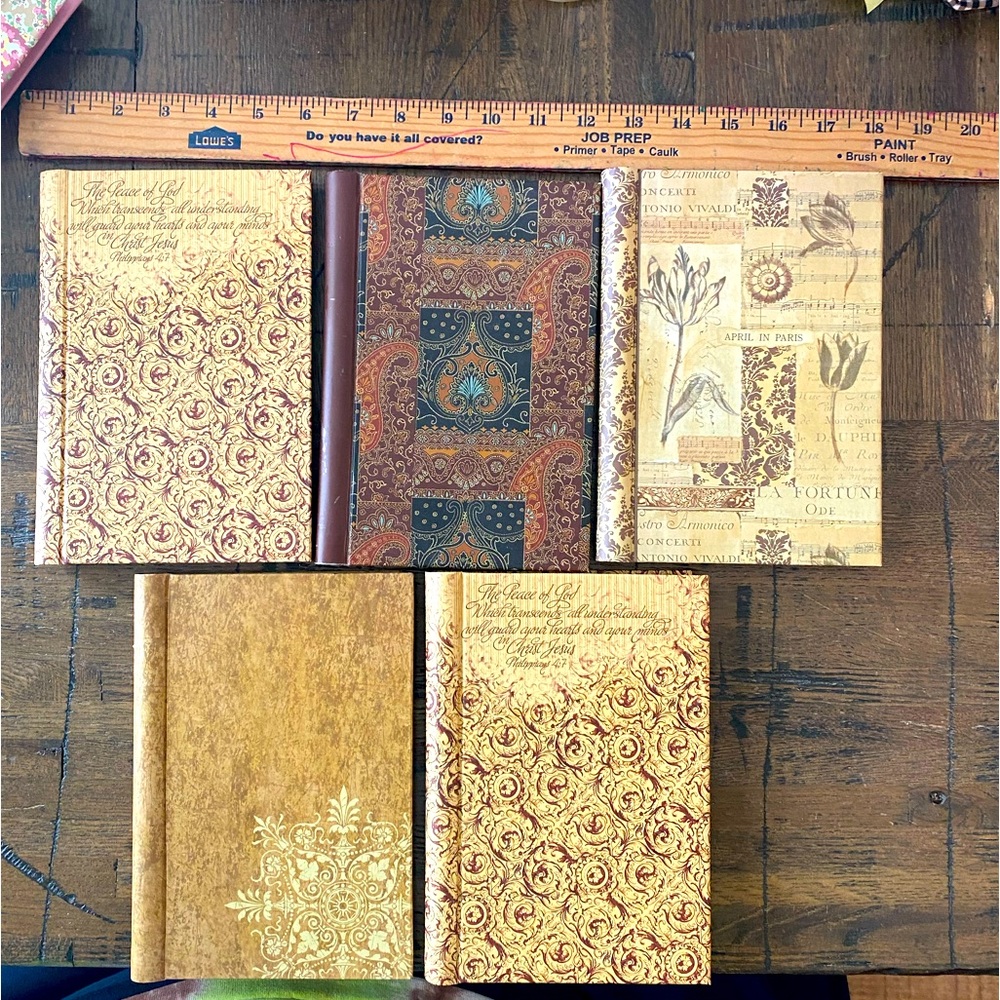 5 Spiral bound journals. Never used.